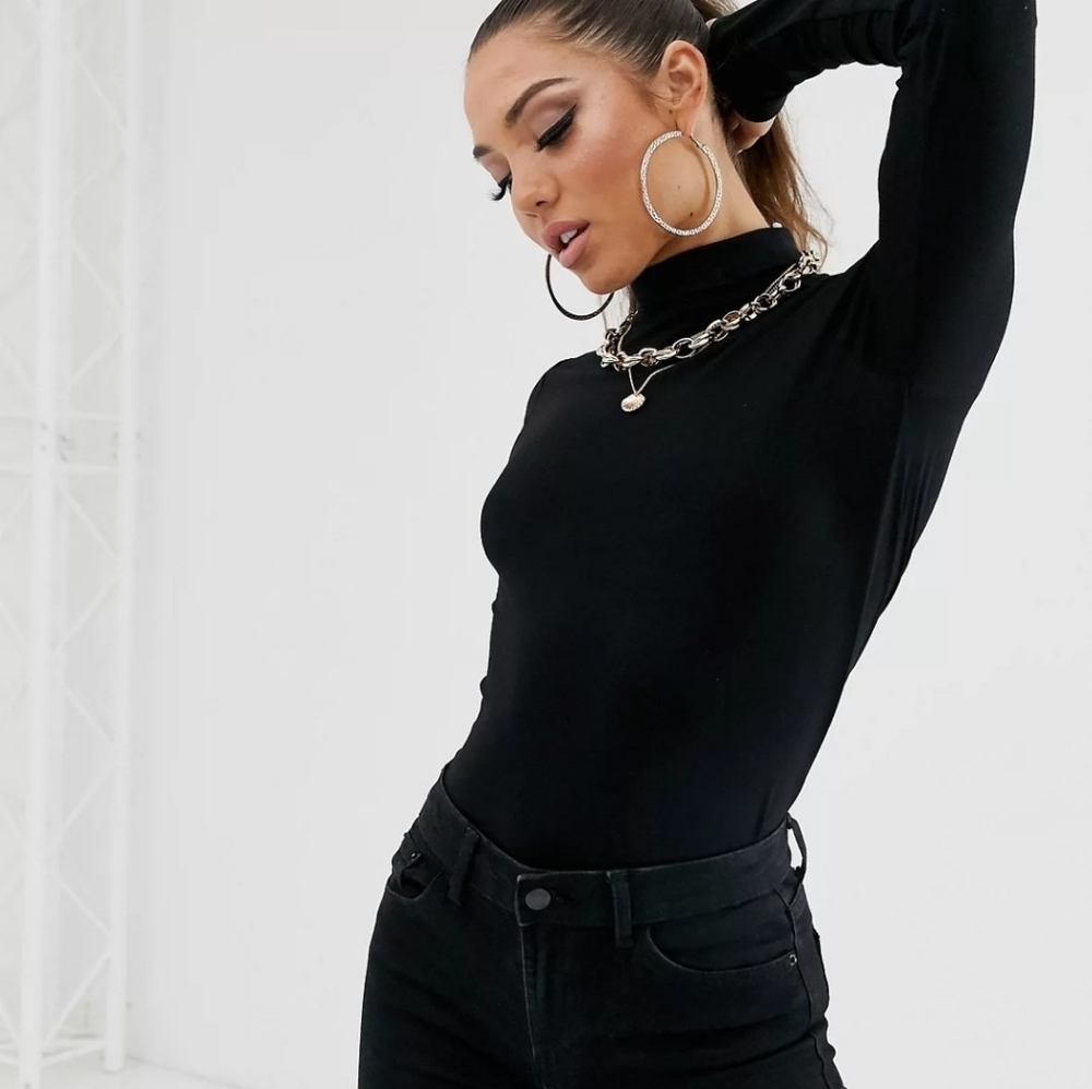 Heattech women's black mock neck,size large .